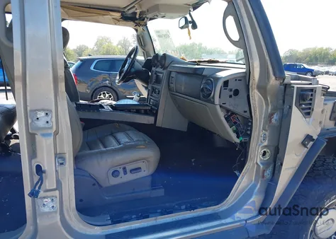 2004 Hummer H2 z USA, uszkodzony, nr VIN 5GRGN23U44H108265